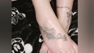 Rubbing lube into my tattooed feet